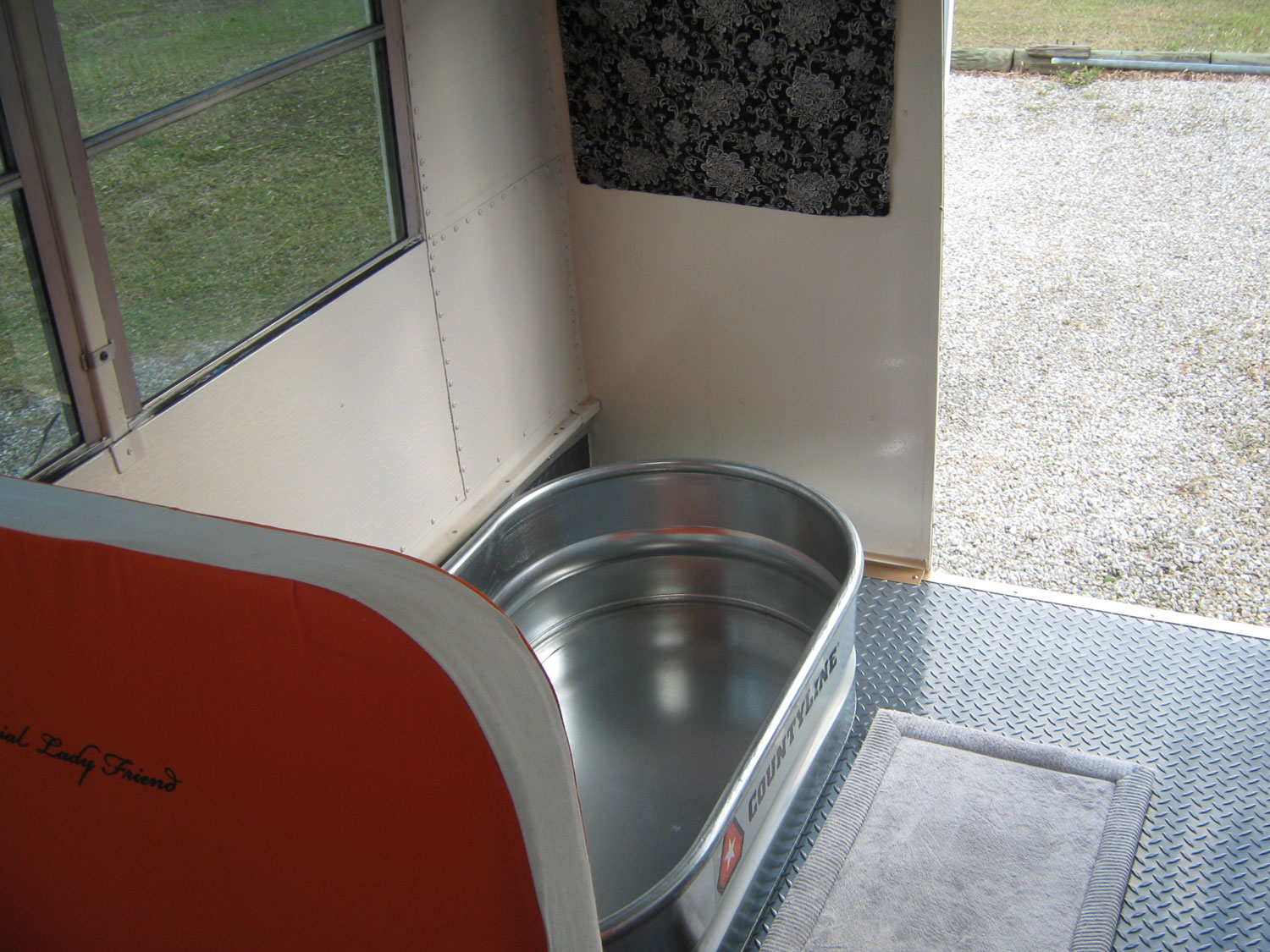 Our Skoolie has a very simple and easy to install and use shower.