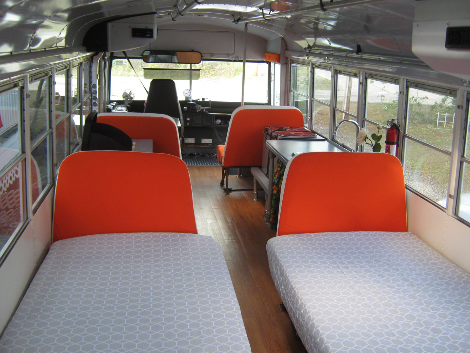 Our Skoolie was designed with two beds.